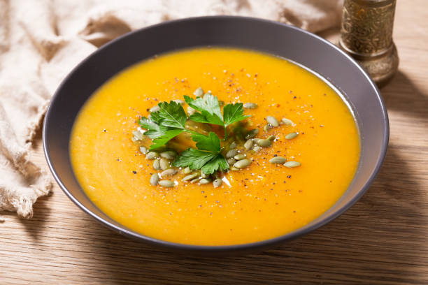 istock plate of pumpkin soup with parsley 1618331787