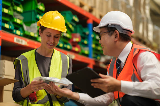 istock Industrial worker working at warehouse factory. 1618332317