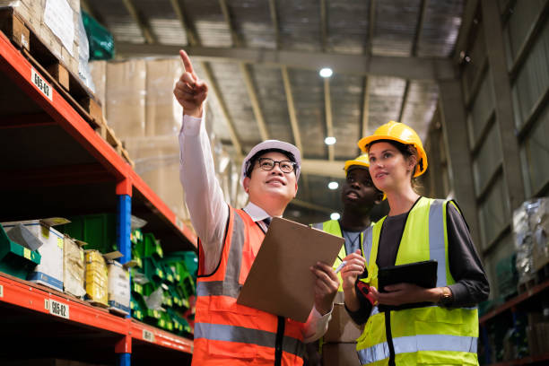istock Industrial worker working at warehouse factory. 1618333916
