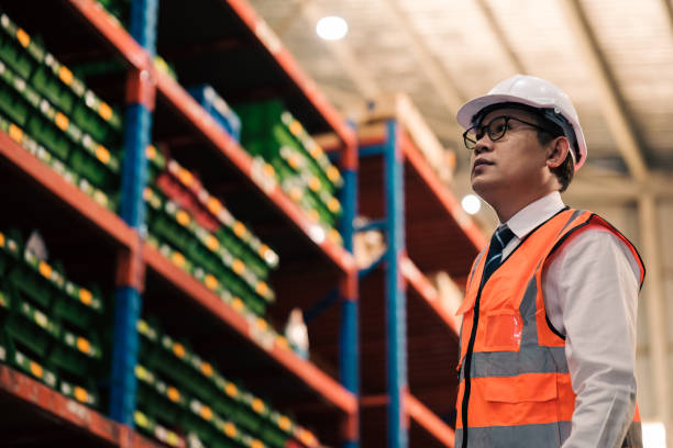 istock Industrial worker working at warehouse factory. 1618340510