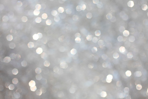 XXXL photo, white glitter, defocused to create a magical sparkly silver and white background for a versatile Christmas, or wedding design.