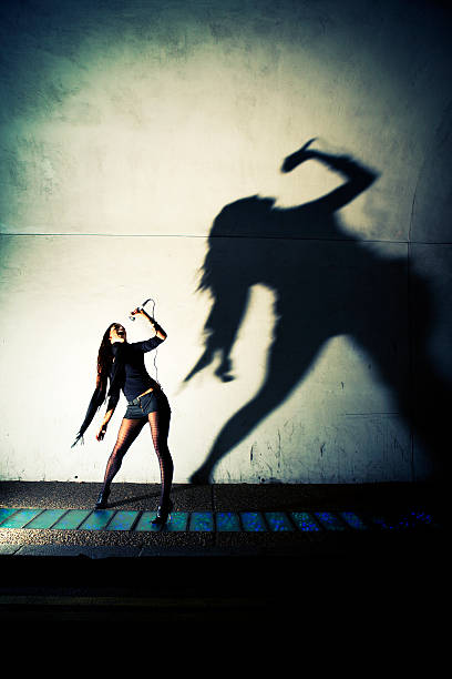 istock Classic rock pose and shadow from a confident young woman 161839307