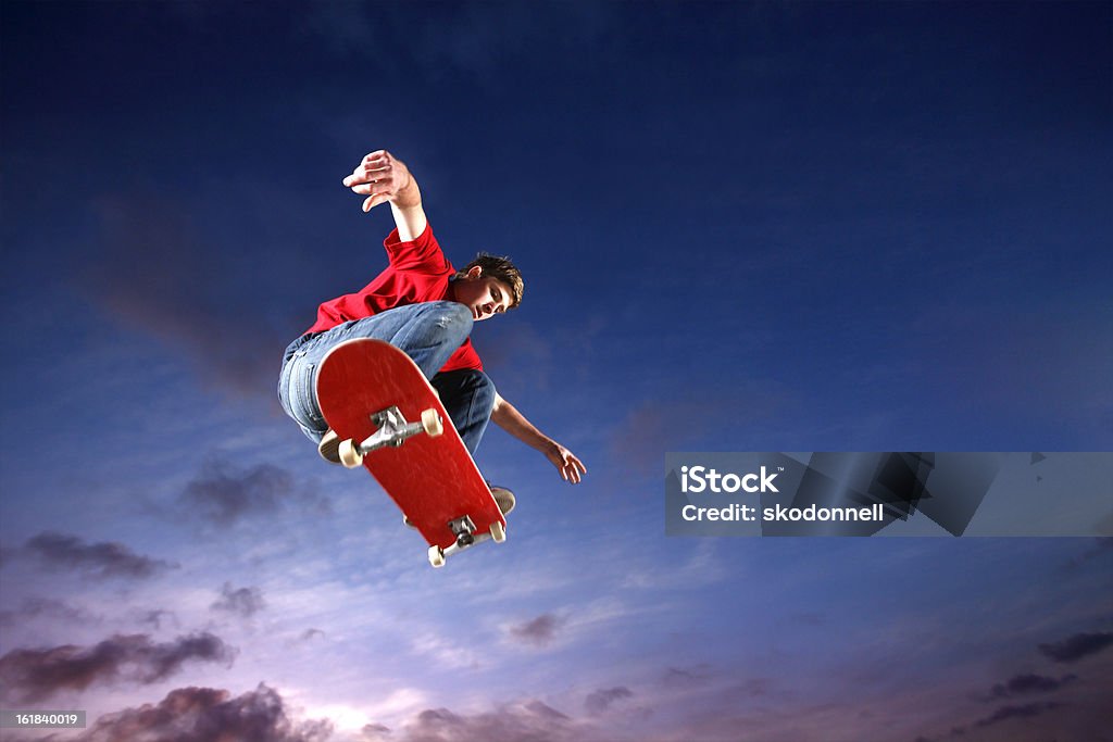 Skateboarder flying through the air  Skateboarding Stock Photo