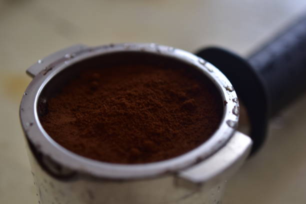 istock Close up of process of making espresso coffee on a coffee machine 1618404391