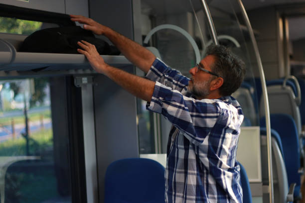istock A man starts a journey by train 1618408928