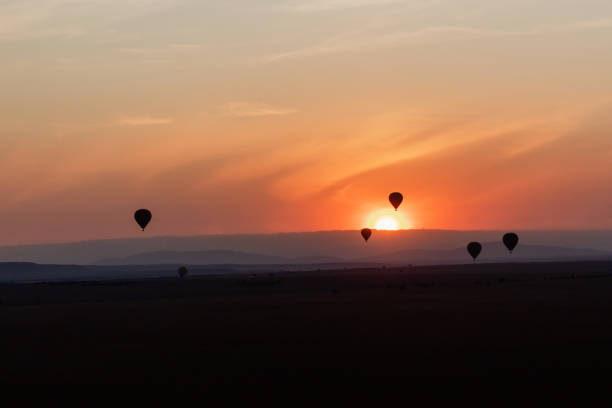 istock Air balloons in sunrise 1618412692