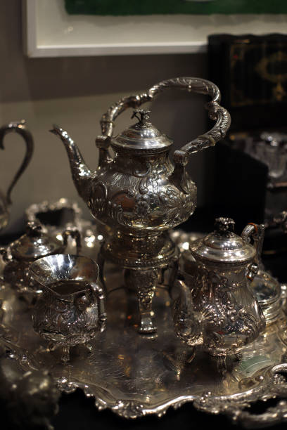 istock antique pieces of silver teapot and cups set 1618440637