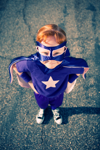 A young girl superhero portrait. Vanquishing evil in a single bound. It is never too early to be super. 