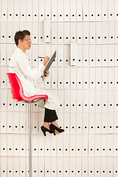 istock Organised Doctor aloft takes notes 161845168