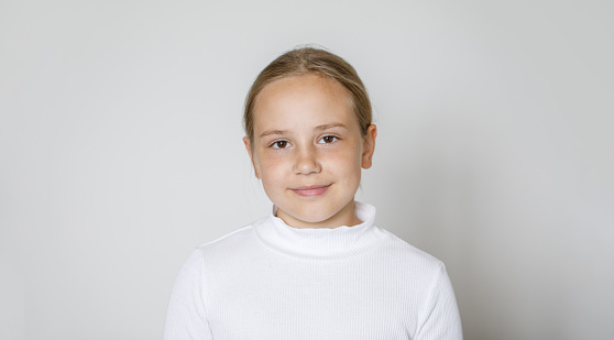 Young girl 10 years old, studio portrait