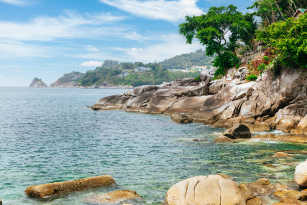 istock Rocky coastline with ocean and island view in Phuket. 1618462117