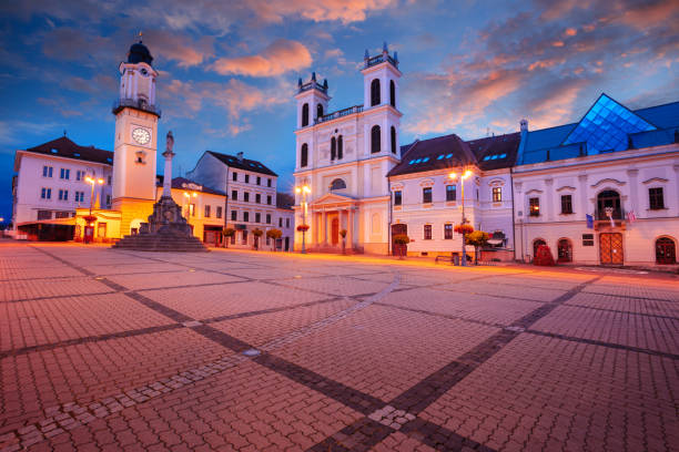 Cityscape image of downtown Banska Bystrica, Slovakia with the Slovak National Uprising Square at summer sunrise.
