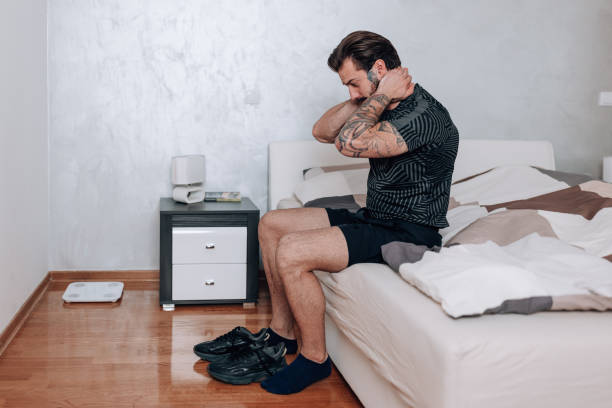 istock Young man readies himself for running 1618475073