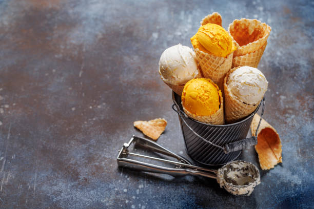 istock Assorted ice cream flavours in delightful waffle cones 1618476950