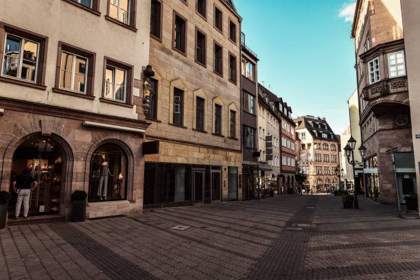 istock Vendors On Cobbled Street In Nuremberg, Germany 1618478045