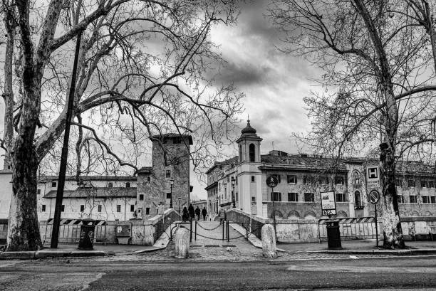 istock Tiber Island in winter in black and white 1618493449