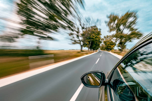 istock A car is driving on the highway, the environment is blurred 1618498903