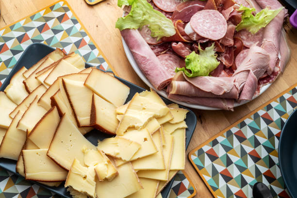 istock Raclette cheese and meat, french tradition 1618507924