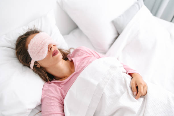 istock A young woman sleeping in a bedroom 1618538310