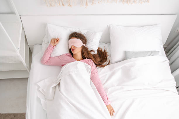 istock A young woman sleeping in a bedroom 1618542411