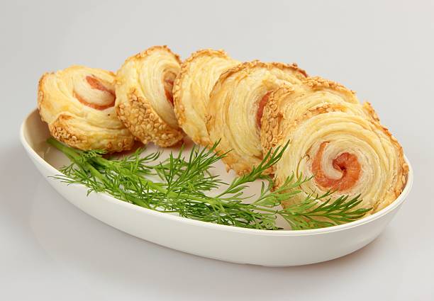 salmon roulade with dill and sesame stock photo