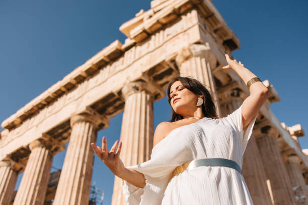 istock Woman posing in front of Parthenon 1618554669