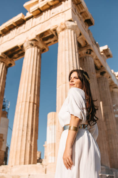 istock Woman posing in front of Parthenon 1618558578