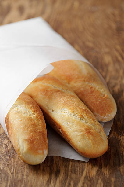 Homemade French bread mini baguettes stock photo