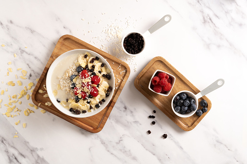 Oatmeal with fruits flat lay photgraphy