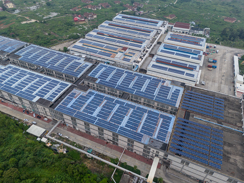 Aerial view of solar power generation on the roof of an industrial workshop