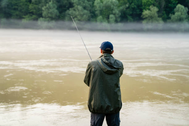 istock Man fishing on the river 1618633141