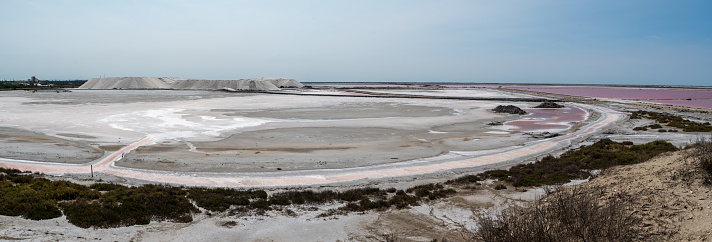 Pink Ponds In Man-made Salt Evaporation Pans In Camargue, Salin de Guiraud, France. High quality photo