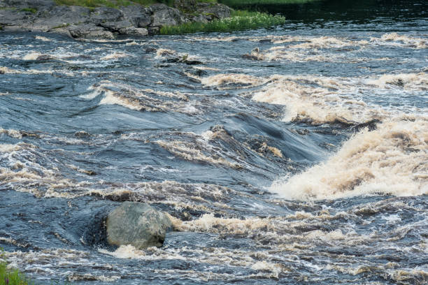 istock turbulent stream in the river rapids 1618652985