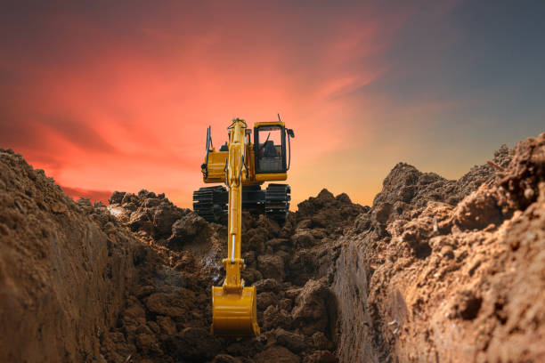 istock Excavators are digging the soil in the construction site 1618657443