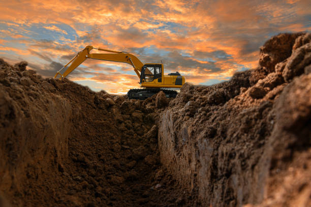 istock Excavators are digging the soil in the construction site 1618657478