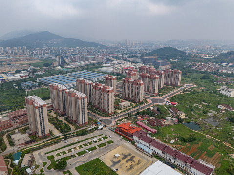 Aerial view of residential buildings and highways in the suburbs