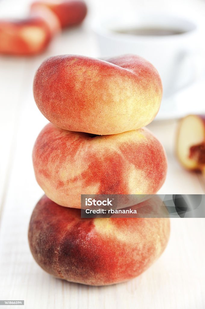 Ripe peaches Three ripe peaches Cup Stock Photo