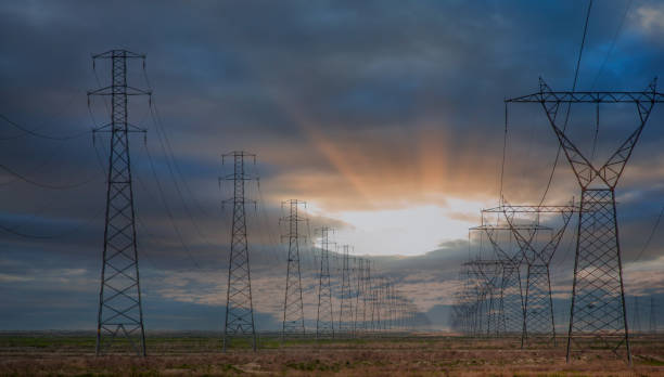 istock High voltage power lines with amazing sunset 1618672582