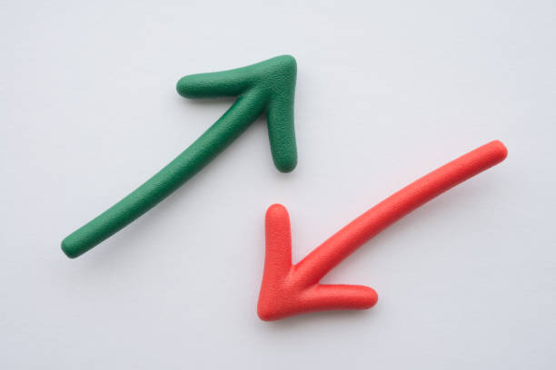 istock Red and green arrow on opposite different direction on white background. 1618674291