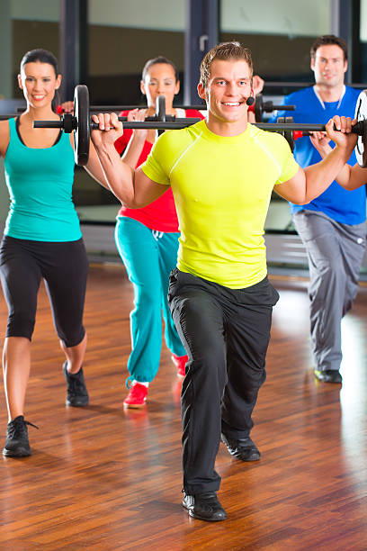 istock weight training in the gym with dumbbells 161872102