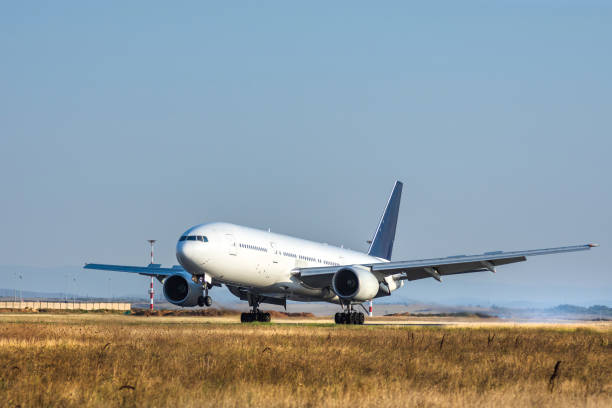 istock Airplane is landing at the airport 1618721177