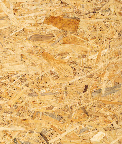 dalla natura alla costruzione: ammirare le variazioni di texture osb - particle plank wood brown foto e immagini stock