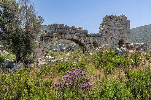 Patara City ancient ruins beside Harbour Street. Patara City is outside of Kalkan City on Turkey's coast. Patara was founded in the 5th century BC. and became the largest port of Lycia. Antalya, Turkey