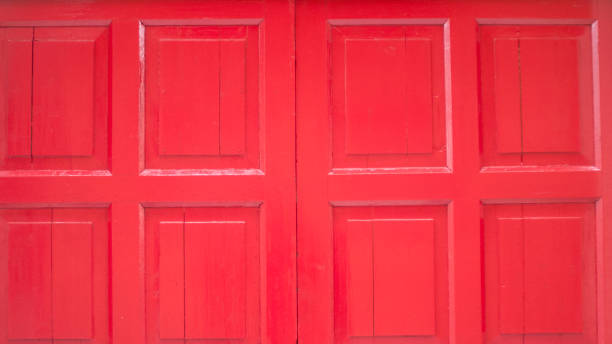 istock Red paint wooden door 1618795449