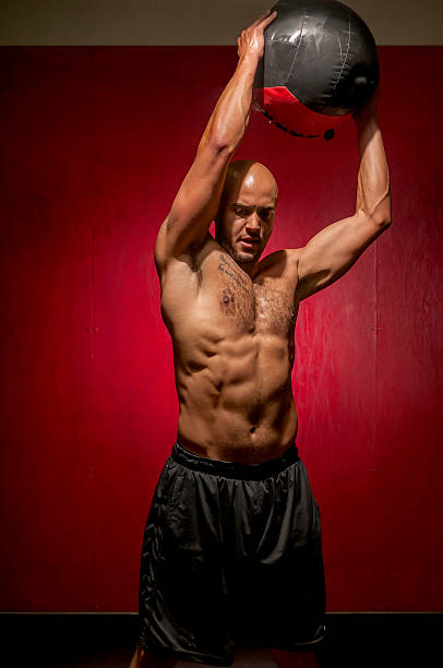 istock gym athlete medicine ball chops 161881971