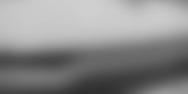 istock Blurry gradient grey glassmorphism color transition frosted glass effect background banner 1618820186