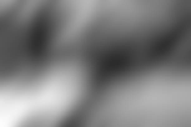 istock Blurry gradient grey glassmorphism color transition frosted glass effect background banner 1618820247