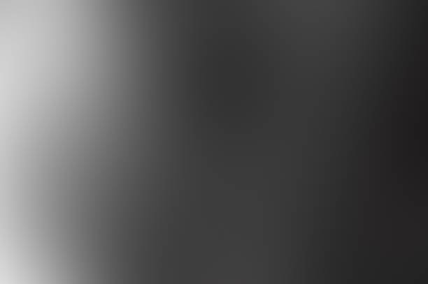 istock Blurred gradient dark gray glassmorphism color transition frosted glass effect background 1618820756