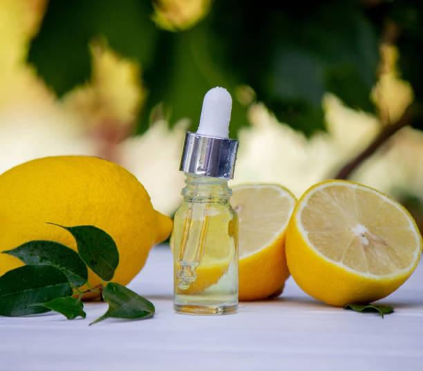 istock lemon oil in jars, fresh lemon. Selective focus. 1618821325