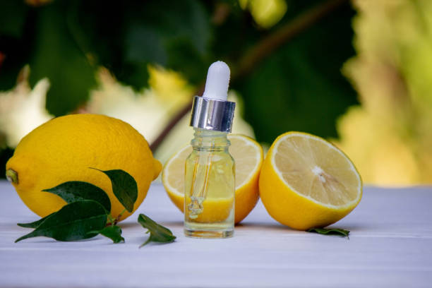 istock lemon oil in jars, fresh lemon. Selective focus. 1618821628